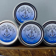 Load image into Gallery viewer, Our Beard Balm is smooth and easy to use yet still has just the right amount of hold and scent to have your beard looking dapper and smelling great all day long. Rub between your hands to melt, then work into your beard and style as usual; layer applications to create more hold if desired.
