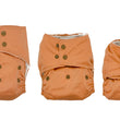 Load image into Gallery viewer, These diapers grow with your baby, from approximately 10lbs until potty trained. They are made with bamboo and hemp cotton, which are the most absorbent fibers. They come with an extra liner, and a bamboo velour liner that is extremely soft against your baby's skin.
