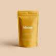 Load image into Gallery viewer, A 100g bag of Turmeric Blume Blend can make approximately 30 lattes. 
